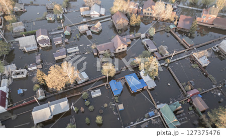 Floods on the planet, global warming. Climate change,natural disastersthe riot of nature. The apocalypse, catastrophes.Storms and destruction.The remnants of human life are floating in dirty water.End 127375476