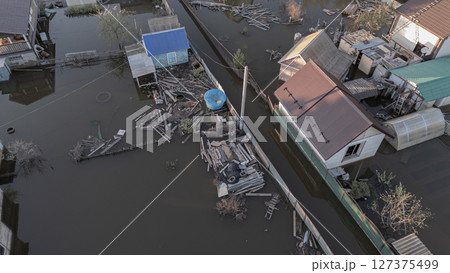 Floods on the planet, global warming. Climate change,natural disastersthe riot of nature. The apocalypse, catastrophes.Storms and destruction.The remnants of human life are floating in dirty water.End 127375499