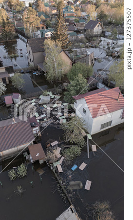 Floods on the planet, global warming. Climate change,natural disastersthe riot of nature. The apocalypse, catastrophes.Storms and destruction.The remnants of human life are floating in dirty water.End 127375507