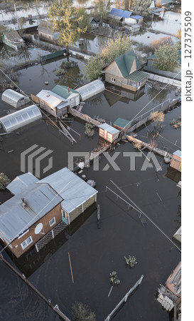 Floods on the planet, global warming. Climate change,natural disastersthe riot of nature. The apocalypse, catastrophes.Storms and destruction.The remnants of human life are floating in dirty water.End Floods on the planet, global warming. Climate change,natural disastersthe riot of nature. The apocalypse, catastrophes.Storms and destruction.The remnants of human life are floating in dirty water.End 127375509