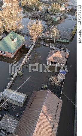 Floods on the planet, global warming. Climate change,natural disastersthe riot of nature. The apocalypse, catastrophes.Storms and destruction.The remnants of human life are floating in dirty water.End 127375513