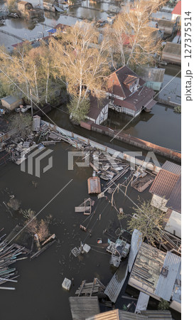 Floods on the planet, global warming. Climate change,natural disastersthe riot of nature. The apocalypse, catastrophes.Storms and destruction.The remnants of human life are floating in dirty water.End Floods on the planet, global warming. Climate change,natural disastersthe riot of nature. The apocalypse, catastrophes.Storms and destruction.The remnants of human life are floating in dirty water.End 127375514