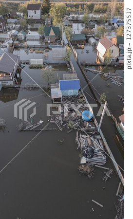 Floods on the planet, global warming. Climate change,natural disastersthe riot of nature. The apocalypse, catastrophes.Storms and destruction.The remnants of human life are floating in dirty water.End 127375517