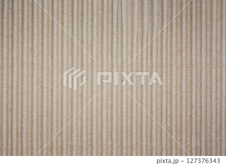 Corrugated Cardboard Texture. Vertical Ribbed Paper Surface Close Up. Stock photo. 127376343