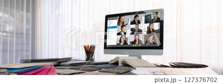 Business people on video conference for brisk virtual group meeting 127376702