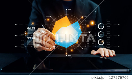 Person Using Digital Tablet to Create 3D Graph Visualization with Futuristic Design Elements Displayed on Screen in Modern Workspace. Qubit Person Using Digital Tablet to Create 3D Graph Visualization with Futuristic Design Elements Displayed on Screen in Modern Workspace. Qubit 127376703
