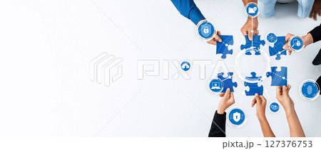 Collaborative Effort in Business Security Solutions with Puzzle Pieces Symbolizing Teamwork and Strategy Development for Optimal Cyber Protection. Amity 127376753
