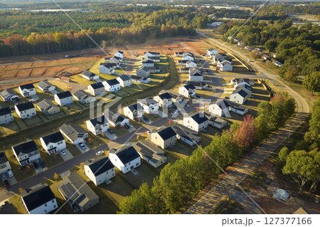 View from above of densely built residential houses in living area in South Carolina. American dream homes as example of real estate development in US suburbs 127377166