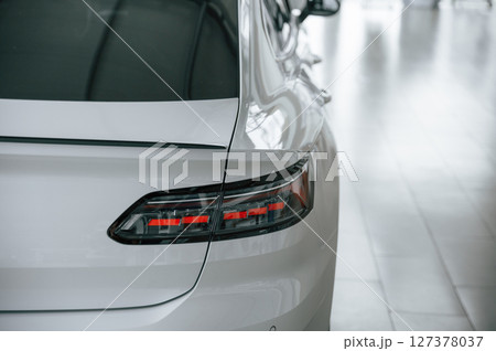 Close up view of the rear part of the modern white car 127378037