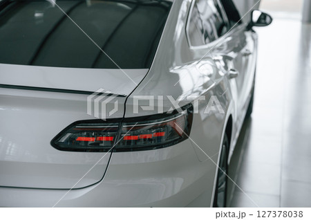 Close up view of the rear part of the modern white car 127378038