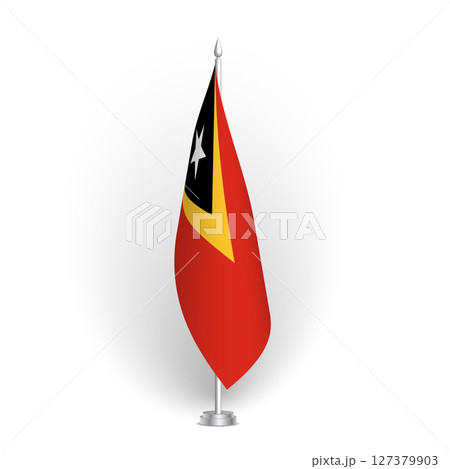 East Timor flag - 3D standard conference flag hanging on ground flagpole. Usable for summit, indoor meeting, board room, government office, press room or reception. Vector flag with shading 127379903