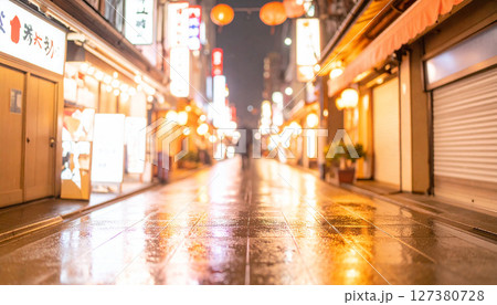 Neon lit Tokyo alleyway blurred and reflected in rainy ground. Generated Image 127380728