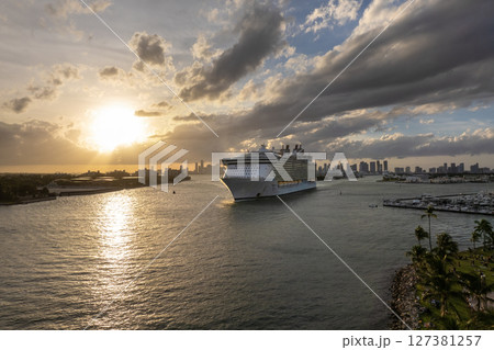 USA travel destination. Miami skyline with ocean cruise liner departing from port. Holiday vacation concept 127381257
