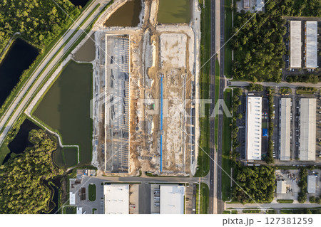 USA logistics and distribution industry development. Construction of warehouse concrete and metal structure of industrial building 127381259