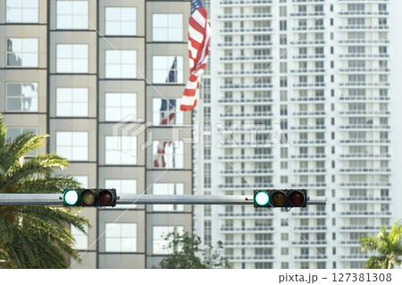 Traffic lights for traffic regulation high above street in Miami, Florida 127381308
