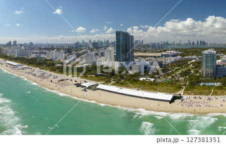 South Beach high luxurious hotels and apartment buildings. American southern seashore of Miami Beach city. Tourist infrastructure in Florida, USA 127381351