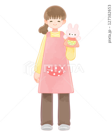 うさぎのパペットを持った保育士の女性　長袖 127382653