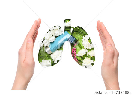 Inhaler cradled with flowers, isolated on white background 127384886