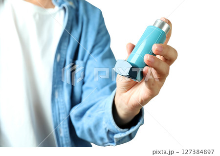 Proper inhaler use demonstrated, isolated on white background Proper inhaler use demonstrated, isolated on white background 127384897