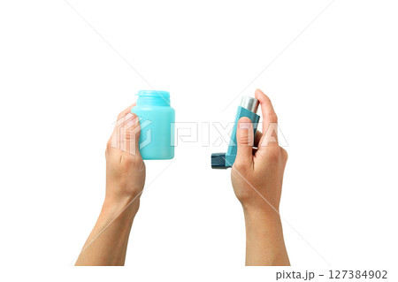 Person with inhaler and meds, isolated on white background Person with inhaler and meds, isolated on white background 127384902