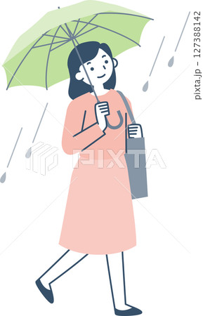 雨の日に傘をさして歩く女性 127388142