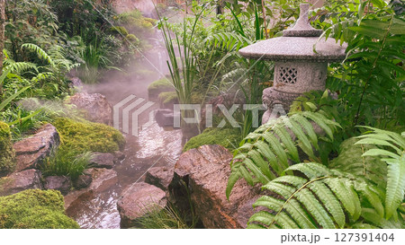 Japanese Zen Garden with Stone Lantern and Misty Stream. Peaceful Nature Scene Japanese Zen Garden with Stone Lantern and Misty Stream. Peaceful Nature Scene 127391404