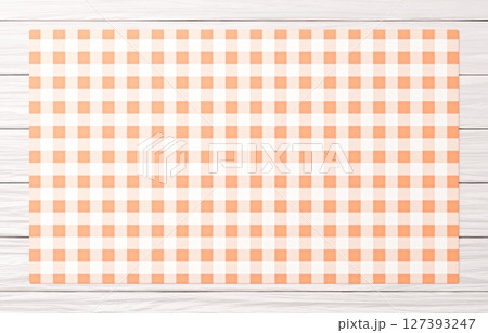 背景素材_木のテーブルと布_オレンジ 127393247