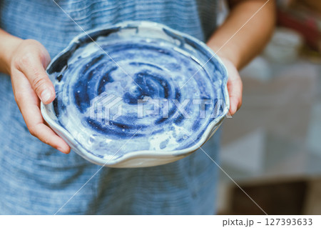 Ceramic products on blur background Ceramic products on blur background 127393633