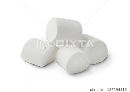 A pile of white marshmallows on a white background A pile of white marshmallows on a white background 127394816
