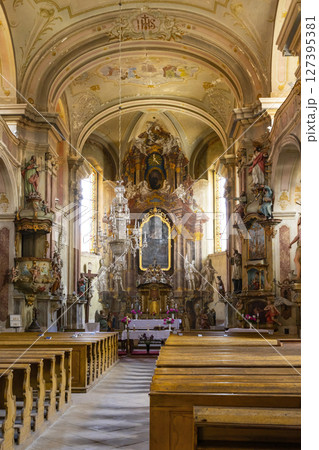 Ornate baroque interior of the Church of Saint Peter and Paul in Ustek, Czechia, illuminating faith and history 127395381