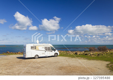 Camper van enjoying breathtaking ocean view in Normandy, France 127395480
