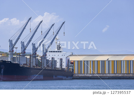 Cargo Ship Docked at the Port of Aviles, Asturias, Spain, Loading Goods 127395537