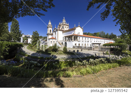 Mosteiro de Sao Miguel de Refojos illuminating Parque do Mosteiro in Cabeceiras de Basto, Portugal 127395542