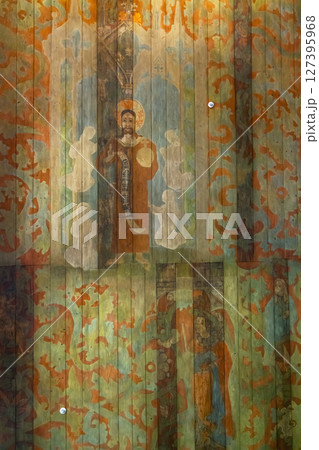 Painting of Saint John the Baptist decorating the wooden ceiling of the Church of the Assumption of the Blessed Virgin Mary in Haczow, Poland 127395968