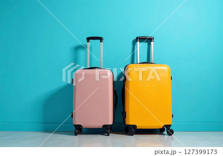 Two luggage suitcases on wheels against wall, vacation. AI Generative 127399173