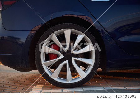 Close up side view of the rear wheel of the modern car 127401903