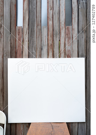 Blank paper on wood Blank paper on wood 127402789