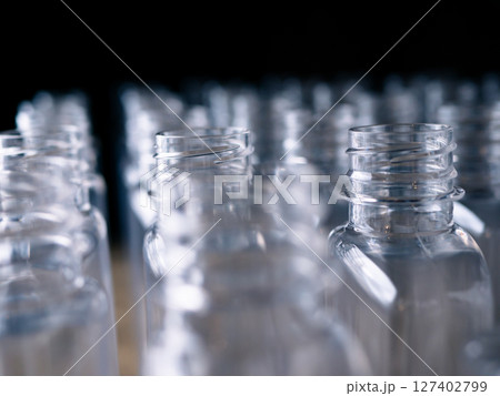 Row of plastic PET Bottles Production Line Ready for Bottling. 127402799