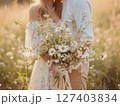 Abstract romantic couple embrace and kiss in meadow field, love concept 127403834