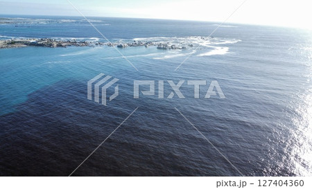 Aerial Abstraction of Foamy Turquoise Ocean Currents Aerial Abstraction of Foamy Turquoise Ocean Currents 127404360