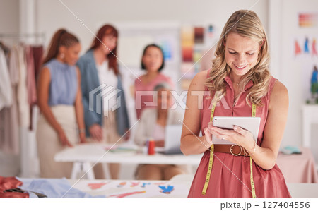 Startup owner, tablet and fashion designer online for communication, ecommerce and online sales with fintech and dropshipping app. Entrepreneur woman on internet for tailor service advertising 127404556