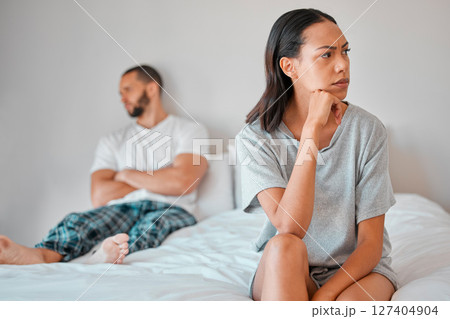 Couple, fight or divorce for angry woman on bed in house, home or hotel bedroom in cheating affair, scandal or argument. Frustrated, mad or annoyed wife and man in stress, burnout or marriage crisis 127404904