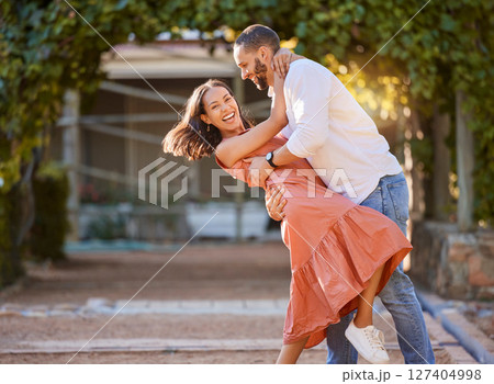 Happy couple, dance and love in park, garden and sunshine for bonding, quality time and romantic date together. Smile, dancing and fun man, woman and partner, freedom and happiness outdoors in summer Happy couple, dance and love in park, garden and sunshine for bonding, quality time and romantic date together. Smile, dancing and fun man, woman and partner, freedom and happiness outdoors in summer 127404998
