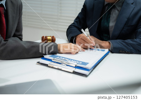 Businessman and Male lawyer or judge consult having team meeting with client, Law and Legal services concept in office. 127405153