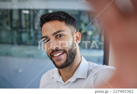Business man, selfie and smile for socila media profile picture with happiness and pride in career choice while at office. Face of professional male entrepreneur with vision and mission for success 127405362