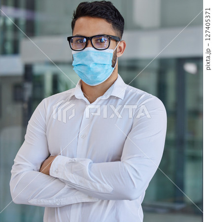 Businessman, mask and glasses with arms crossed in covid vision for health, safety and protection at office. Portrait of confident employee man in healthcare management during pandemic at workplace 127405371