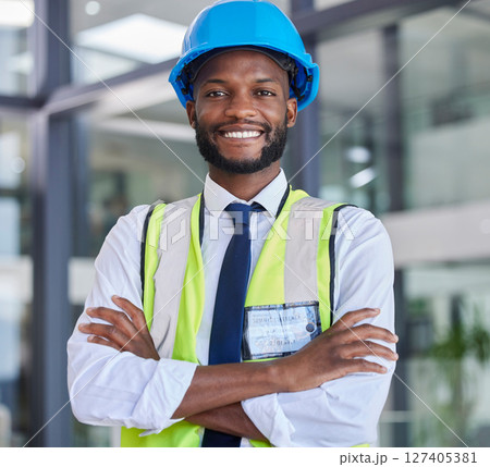 Portrait, construction and engineer man or construction worker with arms crossed in industrial startup office. Architecture, builder and industry with a male business owner in architect company 127405381