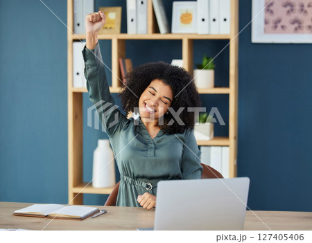 Business woman, laptop and success fist in winner celebration, digital marketing goals or advertising growth target achievement. Smile, happy or creative black woman with arm raised with technology 127405406