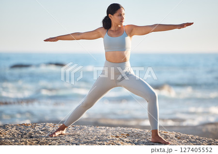 Yoga, stretching and beach woman with body wellness, fitness and pilates workout for outdoor healing, peace and goals. Mental health, healthy lifestyle and exercise girl in sports clothes by the sea Yoga, stretching and beach woman with body wellness, fitness and pilates workout for outdoor healing, peace and goals. Mental health, healthy lifestyle and exercise girl in sports clothes by the sea 127405552