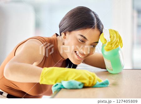 Cleaning, bottle and black woman spray table, desk or furniture bacteria with liquid chemical disinfectant. Housekeeping hygiene product, home cleaning service and cleaner wipe dust with fabric cloth 127405809